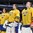 MALMO, SWEDEN - DECEMBER 28: Sweden's Oscar Dansk #35 and Marcus Hogberg #1 look on during the national anthem after a preliminary round win over Finland at the 2014 IIHF World Junior Championship. (Photo by Andre Ringuette/HHOF-IIHF Images)